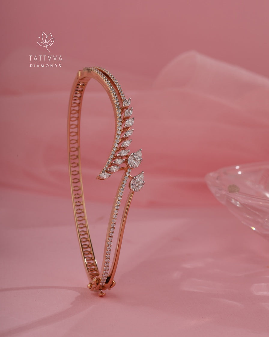 Rose gold diamond-studded headband on a pink background with Tattvva Diamonds logo.