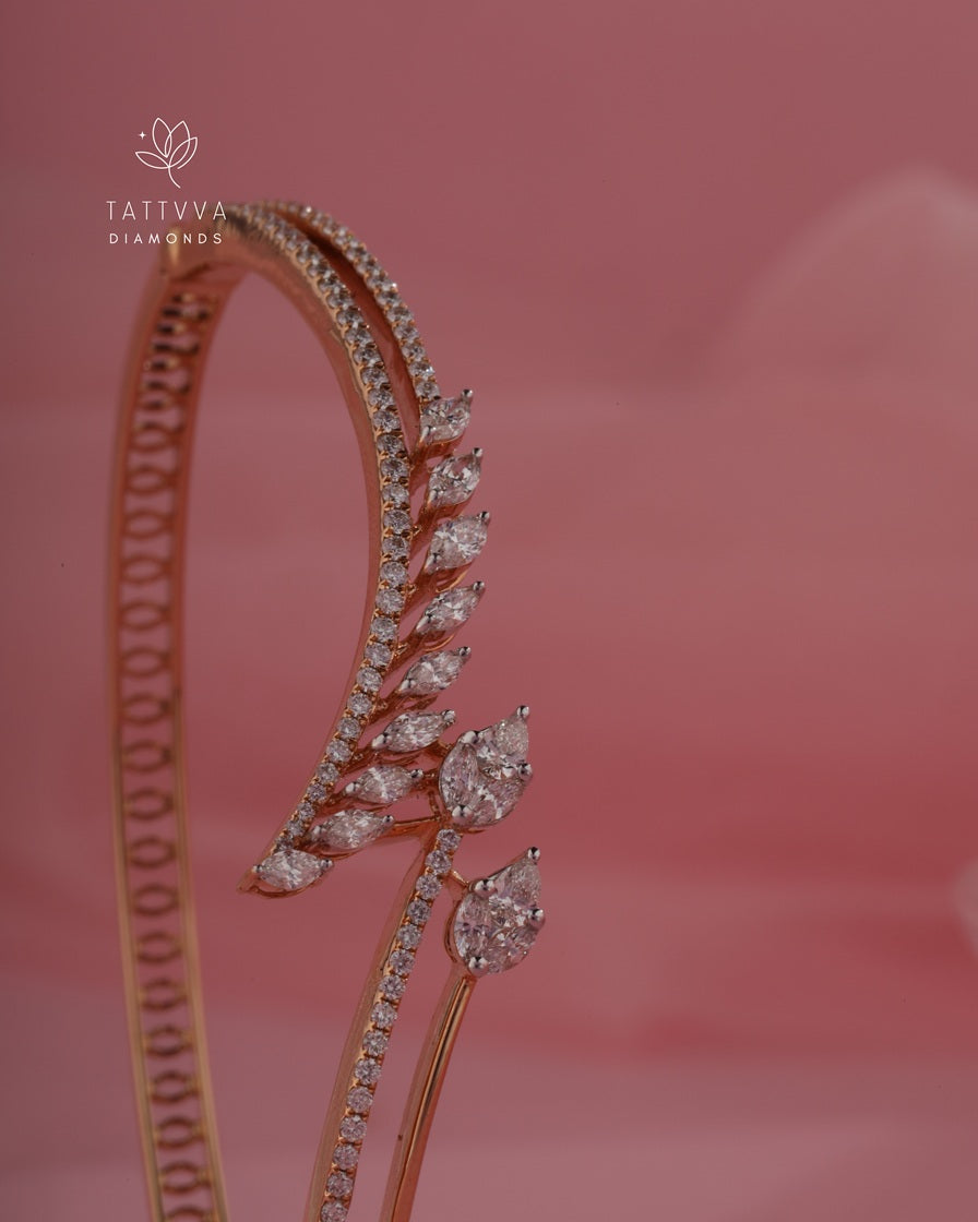 Rose gold diamond-studded headband on a pink background with Tattvva Diamonds logo.