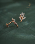 Rose gold diamond stud earrings on a green textured background with Tattvva Diamonds logo.
